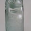 Another angle of the upright codd bottle showing its uneven base