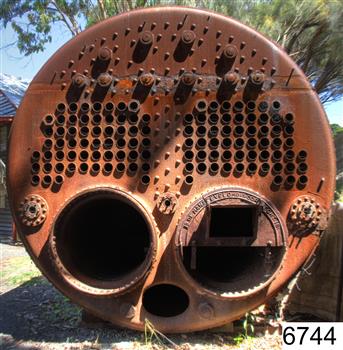 End of boiler has inscriptions, open pipes and sealed pipes
