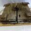 Top and bottom of the plate are well weathered thick timber.
