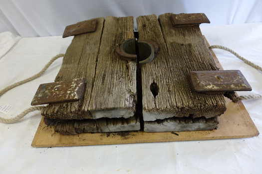 Top and bottom of the plate are well weathered thick timber.