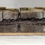 Metal fixture joining the timber is exposed, timber is worn away