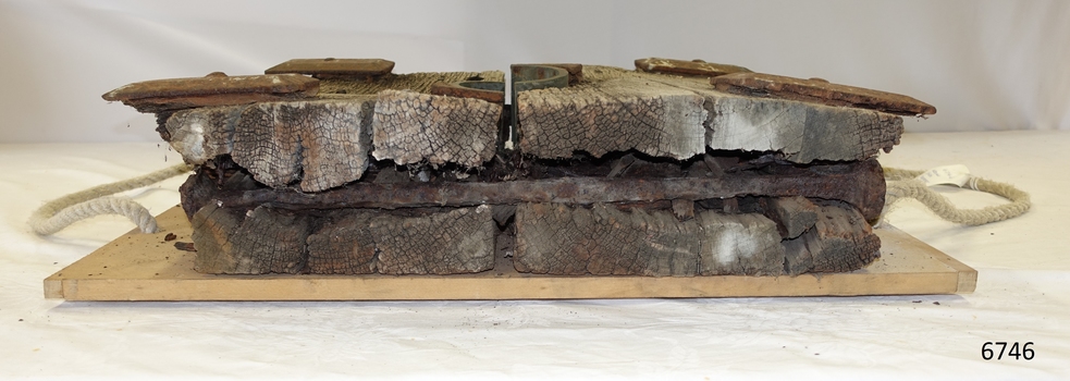 Metal fixture joining the timber is exposed, timber is worn away