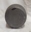 inscriptions are impressed into the base with maker's details