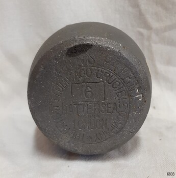 inscriptions are impressed into the base with maker's details