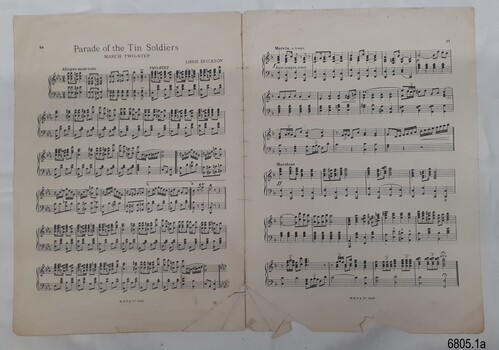 Two page layout of music, part of a book