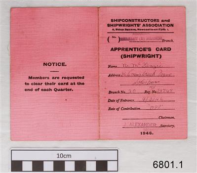Pink cloth covered card cover with printed titles and handwritten text