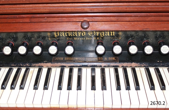 Nameplate states that the organ is a Packard, from the USA