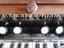 Retailer's details in gold, added above keyboard