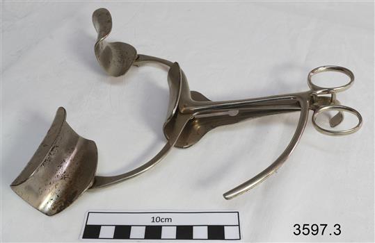 Large stainless steel abdominal forceps used to keep a surgical incision apart during a medical proceedure. Swivel pieces at end of arms are detatchable.