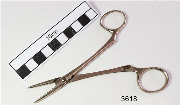 Stainless steel forceps with crocodile teeth grips.