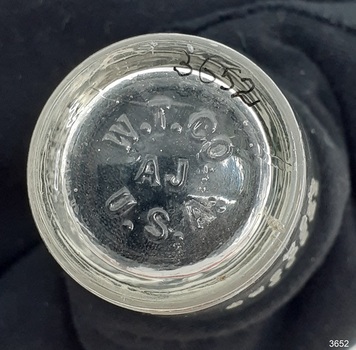Underside has embossed initials of maker and its location