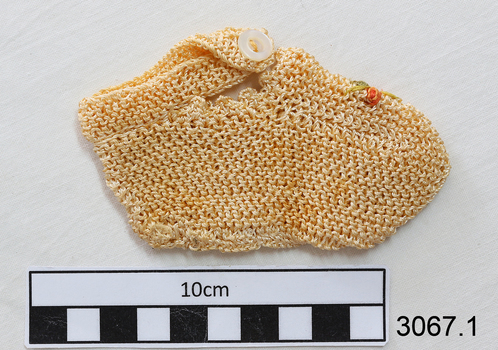 Cream coloured crocheted item