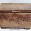 Wooden toolbox has medal keyhole on centre front. The sides have dovetail joints.