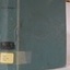 Blue hard cover book with title and library call numbers on the spine