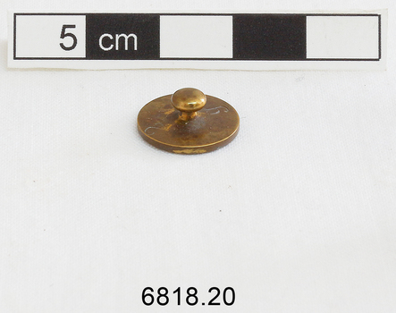 The 20 gram weight used for use by an apothecary. Part of an apothecary set of weights.