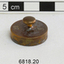 The 20 gram weight used for use by an apothecary. Part of an apothecary set of weights.