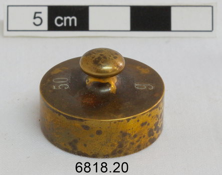 The 50 gram weight used for use by an apothecary. Part of an Apothecary Set of Weights.