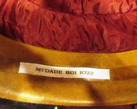 Name is embroidered on white tape