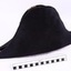 Plain black fabric on the opposite side of the hat