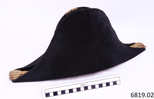 Plain black fabric on the opposite side of the hat