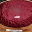 Crown of hat has crimson lining inside