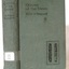 Green hardcover book with printed text on spine and cover; cover has hieroglyphics 