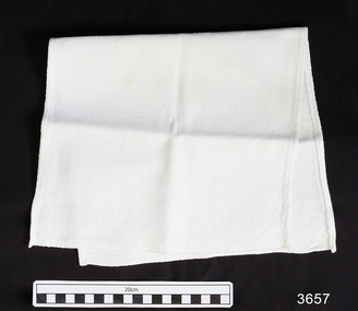 Cloth is white textured cotton