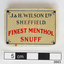 A small rectangular box with the makers name in black and the snuff words written in red