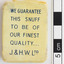 Rear side of the snuff box with words.