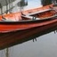 Boat is painted internally in orange and has fitted seats
