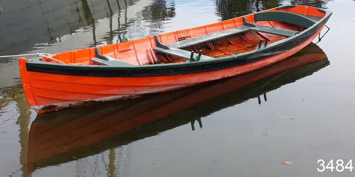 Boat is painted internally in orange and has fitted seats