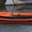 Other side of the boat laying low in the water