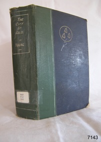 Blue and green book cover, with text title details and circular diagram 