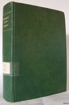 Textured green hardcovered book, embossed gold title on spine
