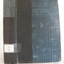 Blue hardcover book with reinforced spine, black print on spine and cover, label on spine