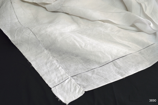 White tablecloth with decorative edging