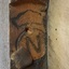 Outline of a crown above a circle that encloses the letter '[N'