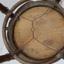 Handwritten inscription on base of chair, 