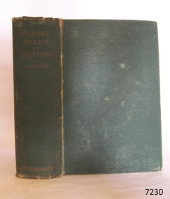 Textured green hardcovered book with gold embossed title on spine