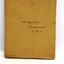 Brown paper covered exercise book with script ink writing