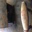 Red handwritten number on wooden handle
