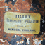 Maker's plate has printed text with details of maker