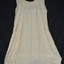 Sleeveless cream silk petticoat with embroidered design on bodice