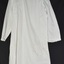 White surgical gown with long sleeves and right breast pocket