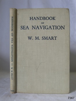 Beige textured hardcover book with text on spine and front cover