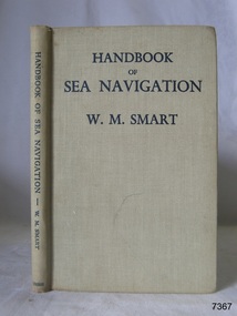 Beige textured hardcover book with text on spine and front cover