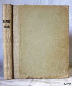 Beige bound book with printed title on the spine