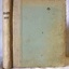 Beige bound book with printed title on spine