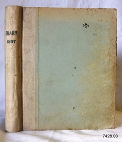 Beige bound book with printed title on spine