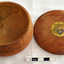 Round wooden box with lid, originally containing lavender soap or powder.